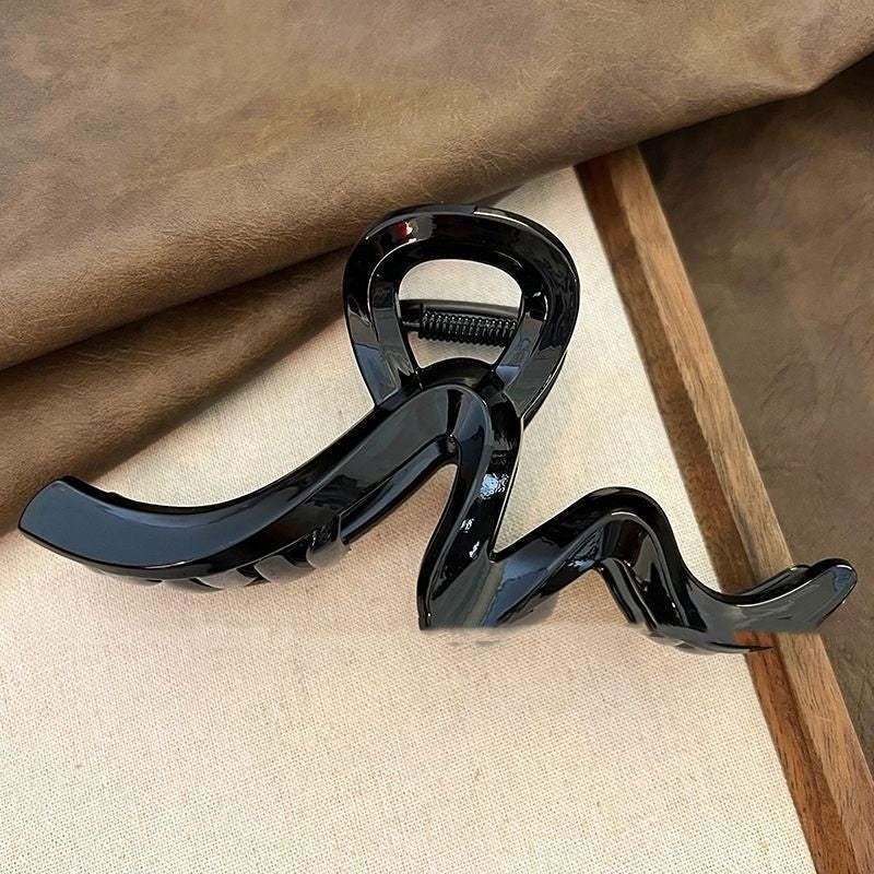 Pince à cheveux pour chignon sophistiqué pour femme