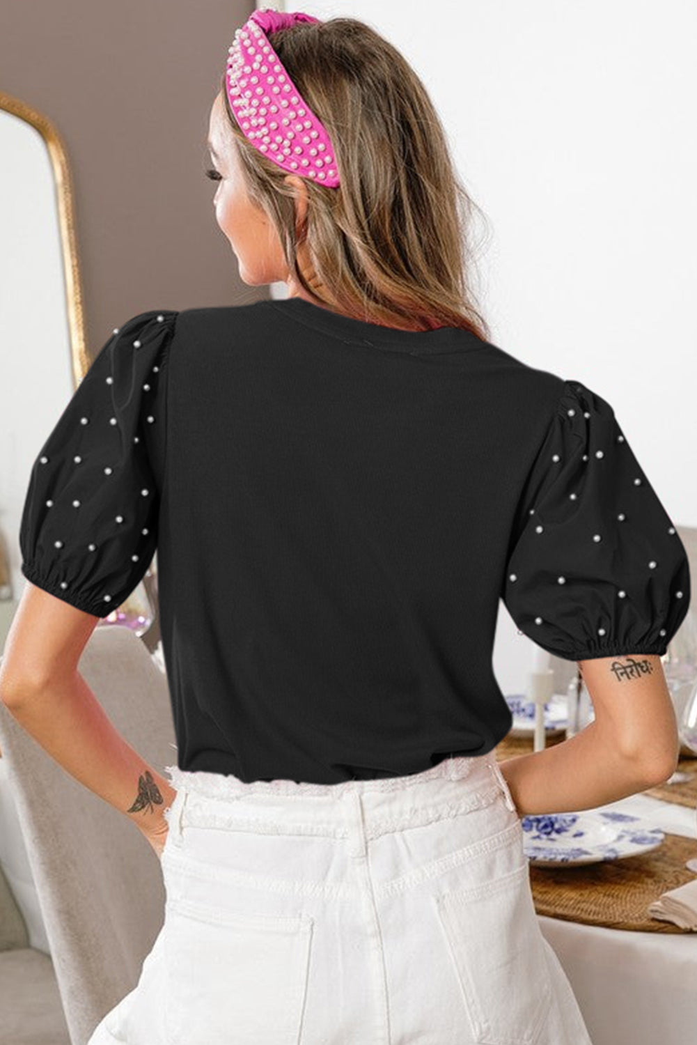 Top à manches bouffées perlées côtelées noires