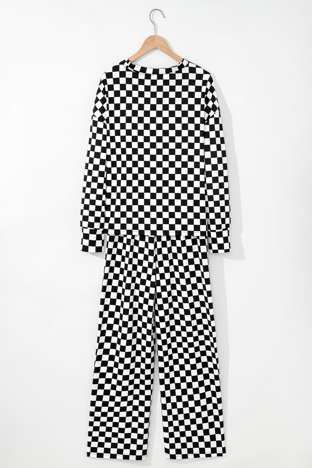 Ensemble de salon noir avec haut à manches longues et pantalon à carreaux