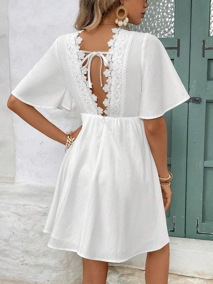 Robe à manches courtes et col en V en dentelle pour femme