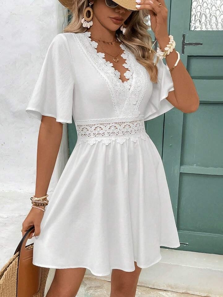 Robe à manches courtes et col en V en dentelle pour femme